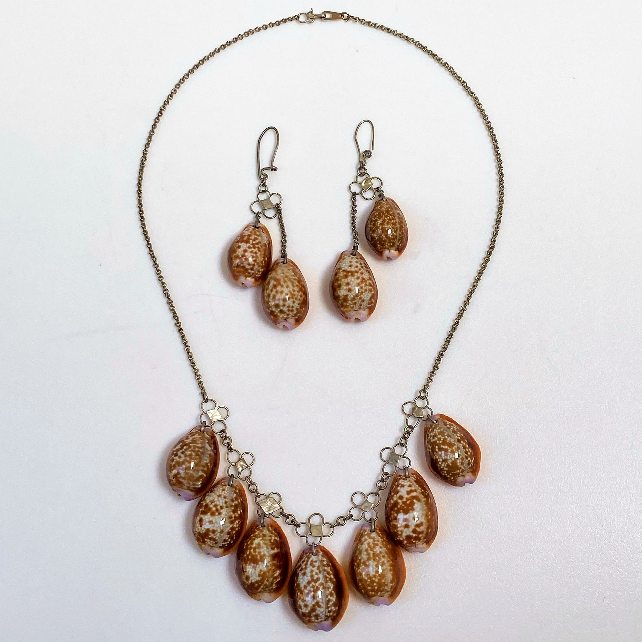 Yellow Metal and Cowry Shell Necklace and Earrings