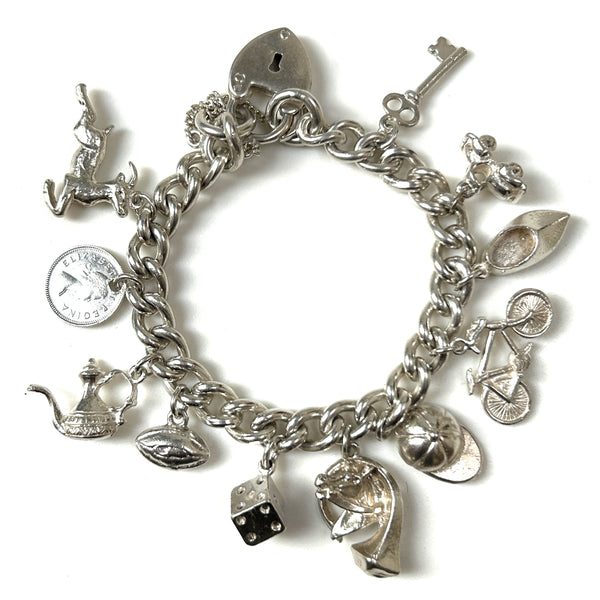 Vintage Silver Charm Bracelet with Eleven Charms
