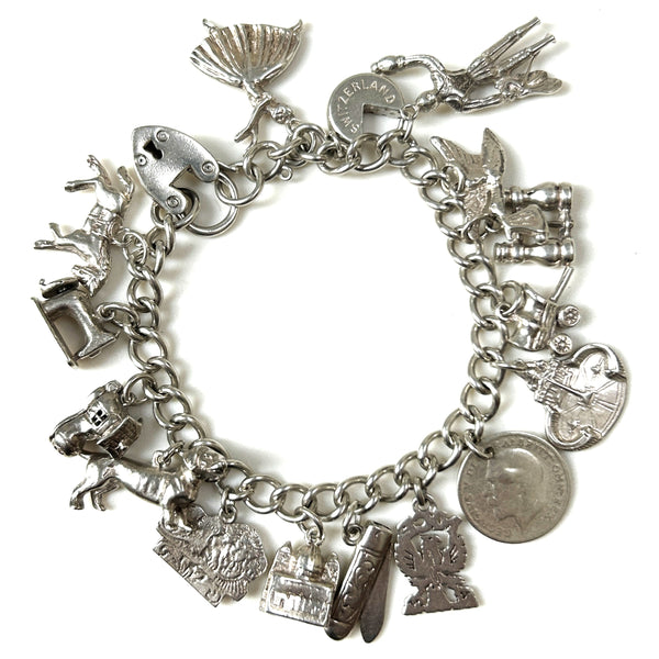 Vintage Silver Charm Bracelet with 16 Charms