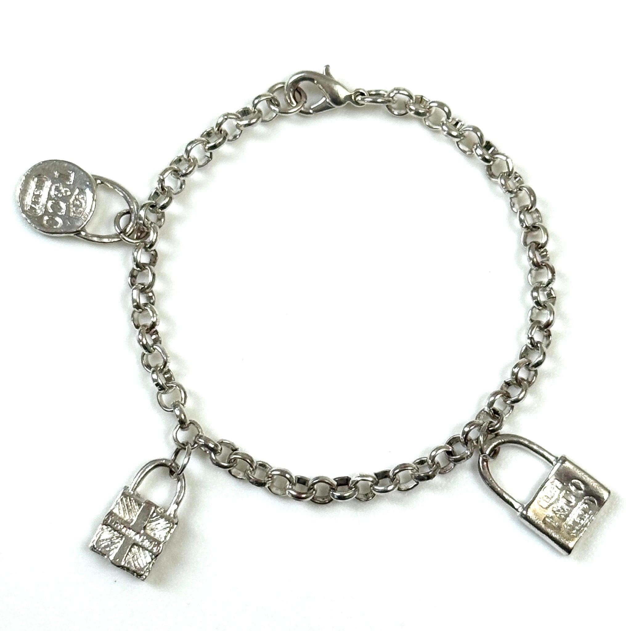 Sterling Silver Padlock Charm Bracelet marked “Tiffany and Co.”