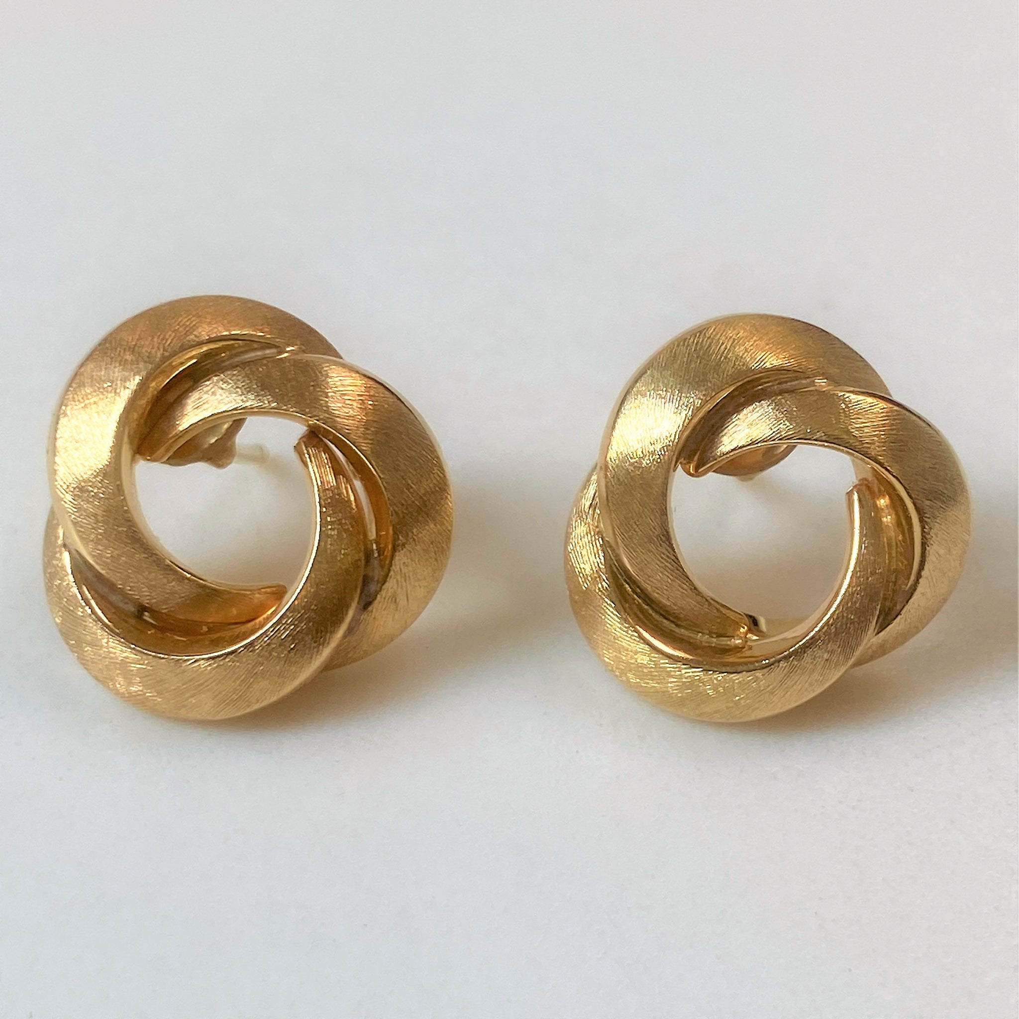 Large gold knot earrings sales